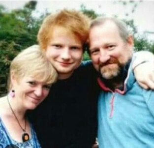 John Sheeran with his wife and son.